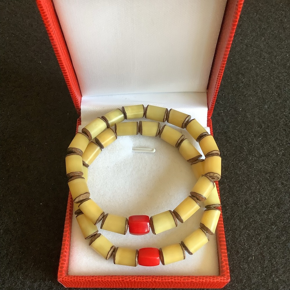 Two natural coral and bodhi root beads bracelets.